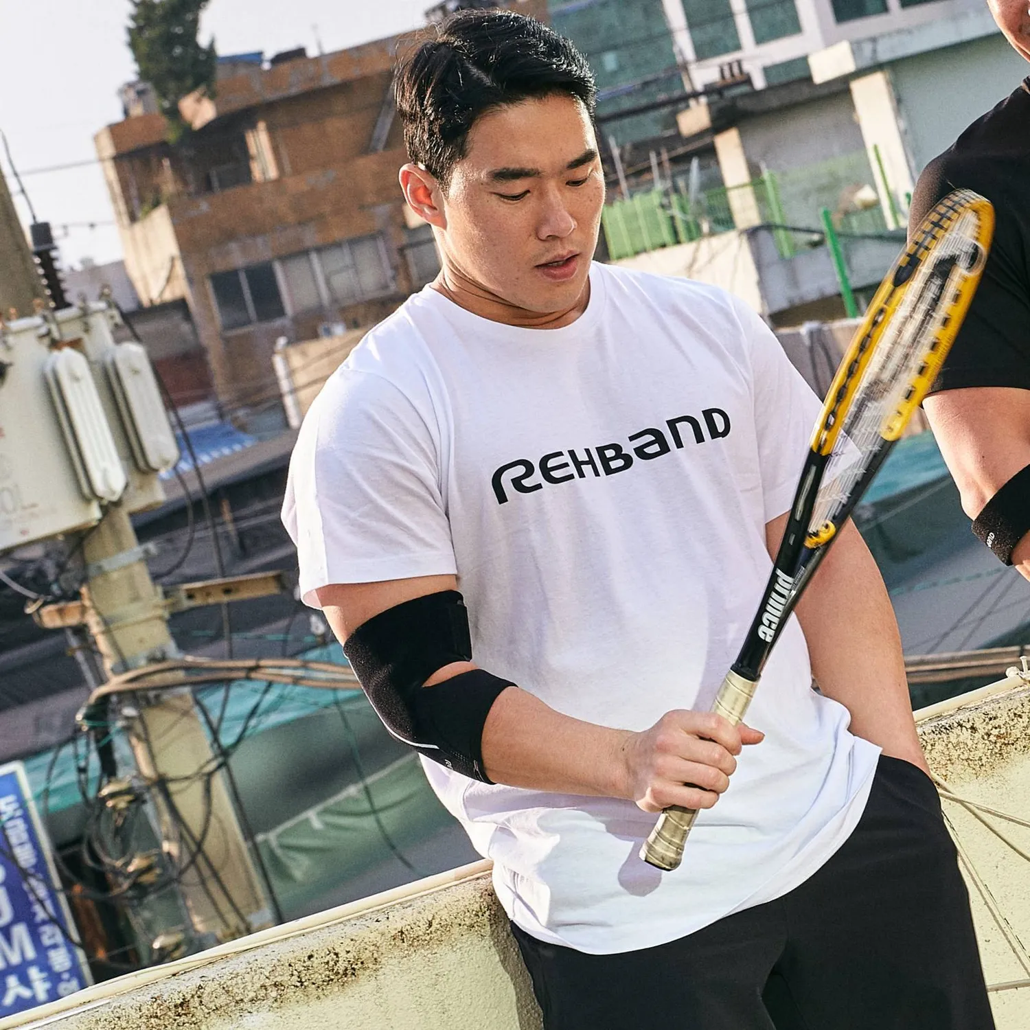 Rehband Tennis Elbow Support gomitiera nero regolabile